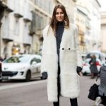 Fashionable white fur coat